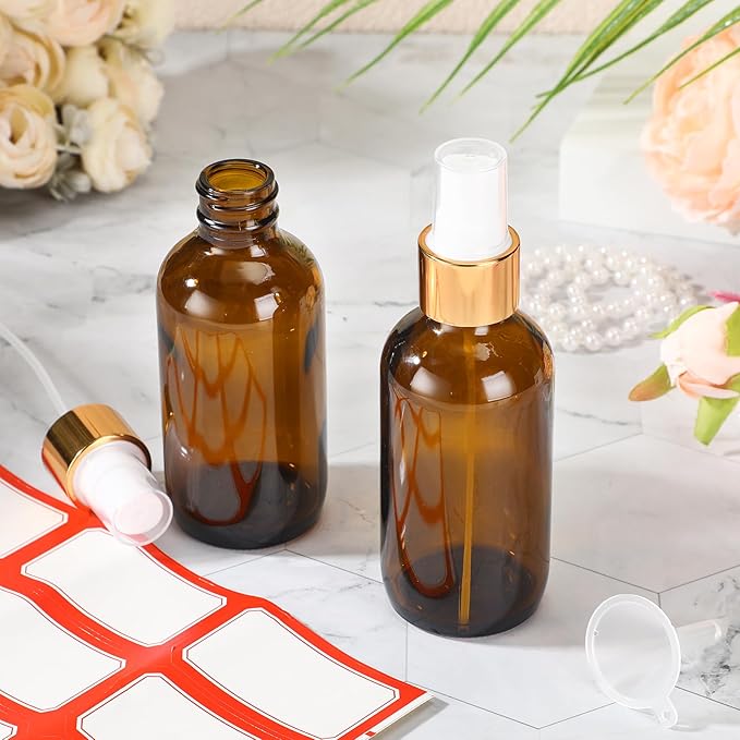 Fumete 2 Pack Glass Bottles 4oz Empty Refillable Liquid Containers with 1 Label 1 Funnel for Essential Oils Hair Travel Plants Cleaning Skin Care(Amber, Golden Top,Mist Bottle)