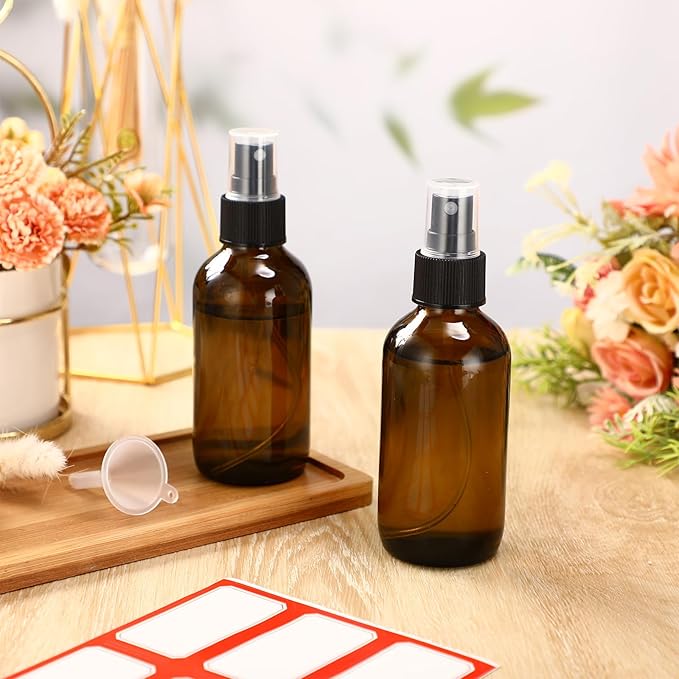 Fumete 2 Pack Glass Bottles 4oz Empty Refillable Liquid Containers with 1 Label 1 Funnel for Essential Oils Hair Travel Plants Cleaning Skin Care(Amber, Black Top,Mist Bottle)