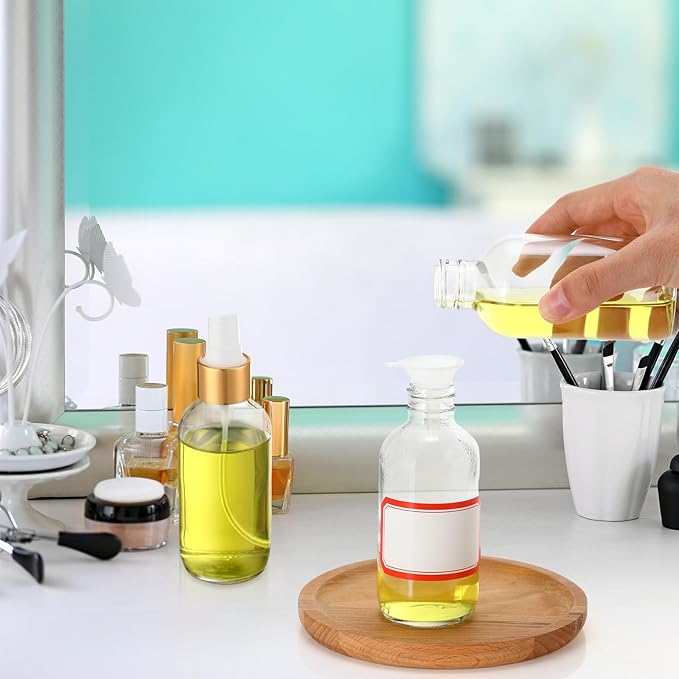 Fumete 2 Pack Glass Bottles 4oz Empty Refillable Liquid Containers with 1 Label 1 Funnel for Essential Oils Hair Travel Plants Cleaning Skin Care(Clear, Golden Top,Mist Bottle)