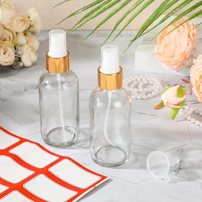 Fumete 2 Pack Glass Bottles 4oz Empty Refillable Liquid Containers with 1 Label 1 Funnel for Essential Oils Hair Travel Plants Cleaning Skin Care(Clear, Golden Top,Mist Bottle)