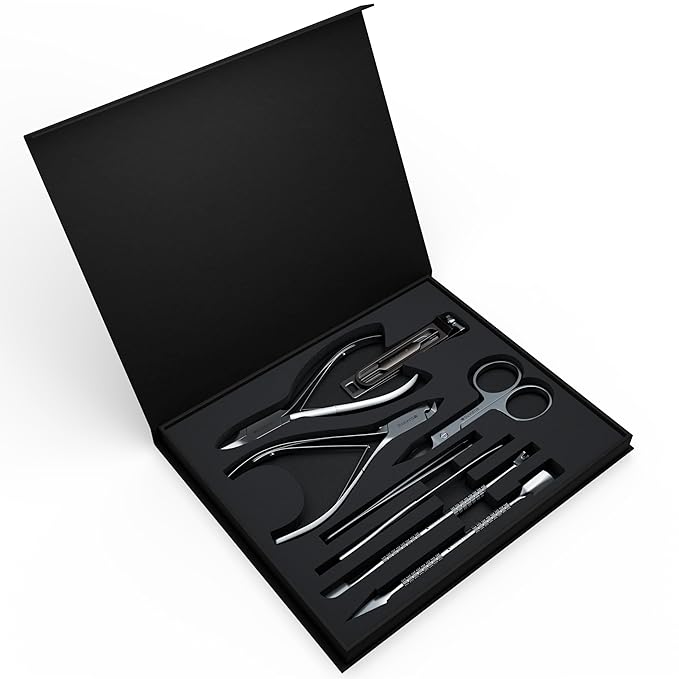 Suvorna Manicure Pedicure set with Toenail Clippers, Cuticle Nippers, Nail Clippers, Nail Scissors, 2 Cuticle Pusher, Nail File & Tweezer - Made with Stainless Steel - Nail Care kit (Black, 8 Pcs)