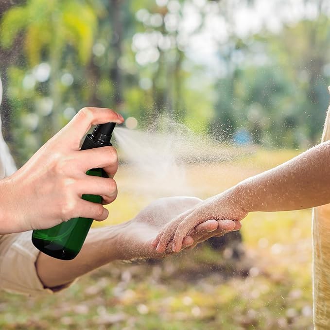 Fumete 2 Pack Glass Bottles 4oz Empty Refillable Liquid Containers with 1 Label 1 Funnel for Essential Oils Hair Travel Plants Cleaning Skin Care(Green, Black Top,Mist Bottle)